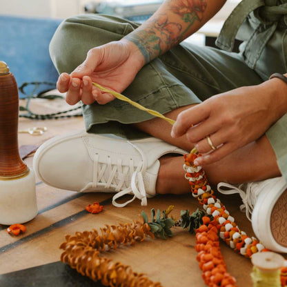OluKai | Pehuea Lī ‘Ili Women's Leather Sneakers - White