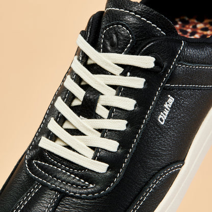 OluKai | Hā‘upu Women’s Leather Sneakers - Onyx