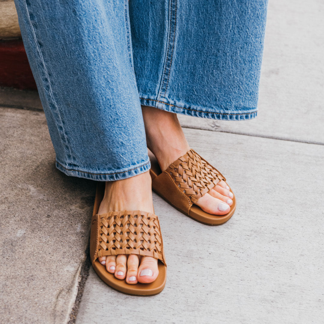 OluKai | Kāmola Women’s Leather Slide Sandals - Tan