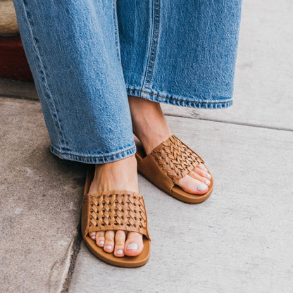 OluKai | Kāmola Women’s Leather Slide Sandals - Tan